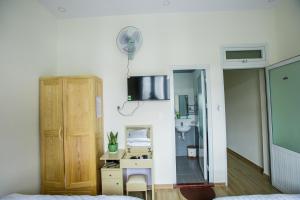 TV a/nebo společenská místnost v ubytování Sơn Liễu Homestay