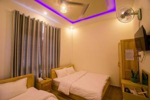 Postel nebo postele na pokoji v ubytování Sơn Liễu Homestay