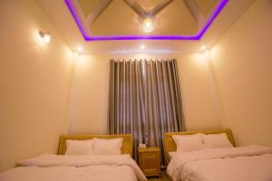 Postel nebo postele na pokoji v ubytování Sơn Liễu Homestay