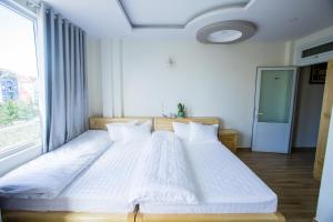 Postel nebo postele na pokoji v ubytování Sơn Liễu Homestay
