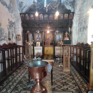 a room with a altar in a church at Studio Cozy - In the Heart of Skyros Village in Skiros