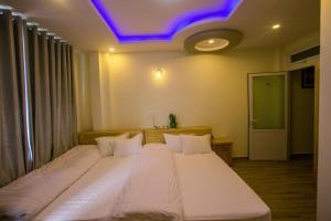 Postel nebo postele na pokoji v ubytování Sơn Liễu Homestay