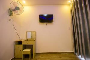 TV a/nebo společenská místnost v ubytování Sơn Liễu Homestay