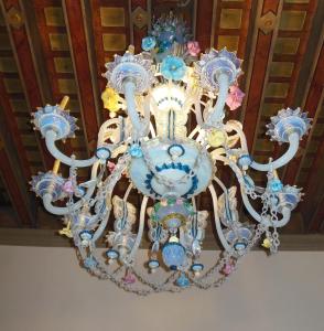 a chandelier is hanging from a ceiling at Hotel Sant'Antonin in Venice