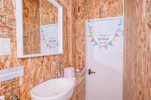 Koupelna v ubytování Guesthouse KOBE YAMATOMUSUBI + 29 fotografií