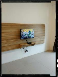 a television on a wall in a room at Bishops Cap at Cameron Highlands in Brinchang