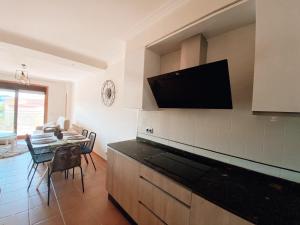 Kuchnia lub aneks kuchenny w obiekcie APARTAMENTO ANTOPA MAR