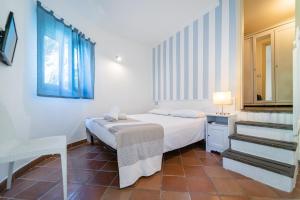 Postel nebo postele na pokoji v ubytování Villa Cinque Pini