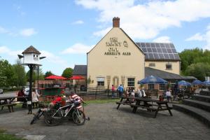 a group of people on bikes in front of a building at The Tawny Owl in Swindon