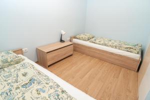 Posteľ alebo postele v izbe v ubytovaní Elena Apart