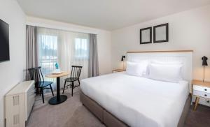 Precise Resort Marina Wolfsbruch - Familienapartments客房内的一张或多张床位