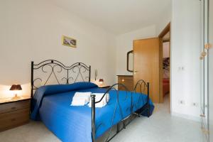 Ein Bett oder Betten in einem Zimmer der Unterkunft Casa Marinella