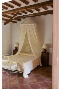 En eller flere senge i et værelse på Residenza Cà d´Masseu