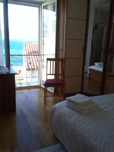 Postel nebo postele na pokoji v ubytování Rooms Katica