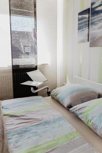 Postel nebo postele na pokoji v ubytování SK Apartments - Green