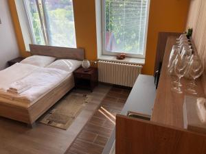 Postel nebo postele na pokoji v ubytování DNM Inn