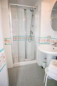 a bathroom with a shower and a sink at La Piazzetta in Amalfi +47 photos