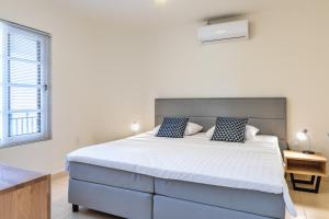 Ένα ή περισσότερα κρεβάτια σε δωμάτιο στο Bellevue Beach Apartment 5 +24 φωτογραφίες