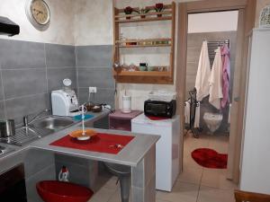 Kuchyň nebo kuchyňský kout v ubytování Suites Rome