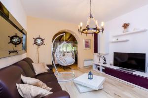 Χώρος καθιστικού στο Camelia Luxury Apartments