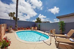 The swimming pool at or near SureStay Hotel by Best Western San Diego Pacific Beach