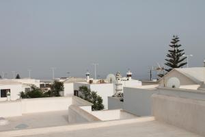 a view of the roofs of white buildings at El sueño - Le rêve in San Bartolomé