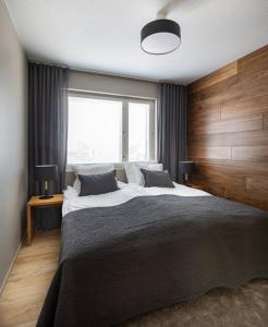 Postel nebo postele na pokoji v ubytování Levin Kunkku, Apartment B7