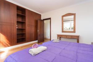 Łóżko lub łóżka w pokoju w obiekcie VILLA MANOLO DE L´ALZINA