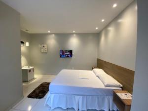 Mega Aeroporto Hotel Apenas 1 km de distância do Aeroporto de Fortaleza客房内的一张或多张床位