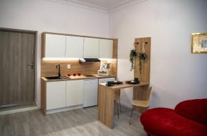 Kuchyňa alebo kuchynka v ubytovaní Apartamenty Centrum