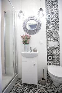 A bathroom at Apartamenty Centrum