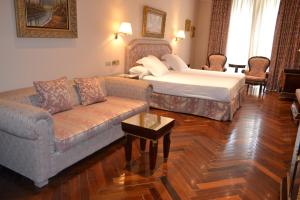Cama ou camas em um quarto em Hotel Alameda Palace