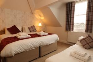 Cama o camas de una habitación en County Hotel