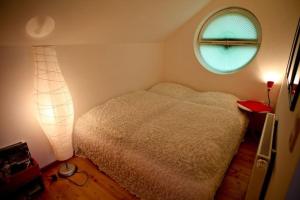 Ein Bett oder Betten in einem Zimmer der Unterkunft Ferienhaus Kastaniengrün