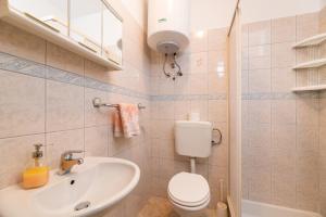 Kúpeľňa v ubytovaní Apartman Petelin + 37 fotografií