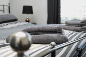 Postel nebo postele na pokoji v ubytování Hullidays - University Side Lg 4 bed House