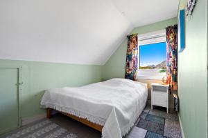 Giường trong phòng chung tại Selmas hus