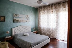 מיטה או מיטות בחדר ב-la casetta del tesoro