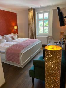 Llit o llits en una habitació de Hotel Alte Posthalterei