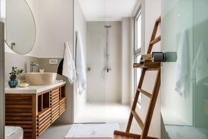 Koupelna v ubytování Balance Hotel