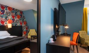 Postel nebo postele na pokoji v ubytování Thon Hotel Harstad