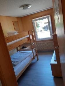 Postel nebo postele na pokoji v ubytování Berner Oberland