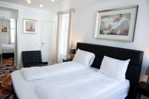 Säng eller sängar i ett rum på A Hotels City