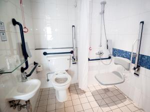 a bathroom with a toilet and a sink at Holiday Inn Express Ramsgate – Minster by IHG in Minster