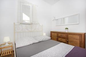 Postelja oz. postelje v sobi nastanitve Apartments Silva