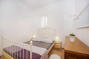 Postelja oz. postelje v sobi nastanitve Apartments Silva