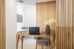 TV a/nebo společenská místnost v ubytování Balance Hotel