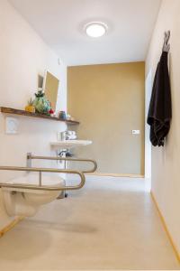 a bathroom with a sink and two sinks at De Nieuwe Warande in Tilburg +32 photos
