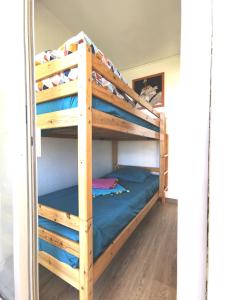 a bunk bed room with two bunk beds in a room at Appartement Vue Mer 208 in Canet-en-Roussillon