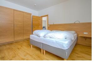 Postel nebo postele na pokoji v ubytování Hotel Sonnleitn